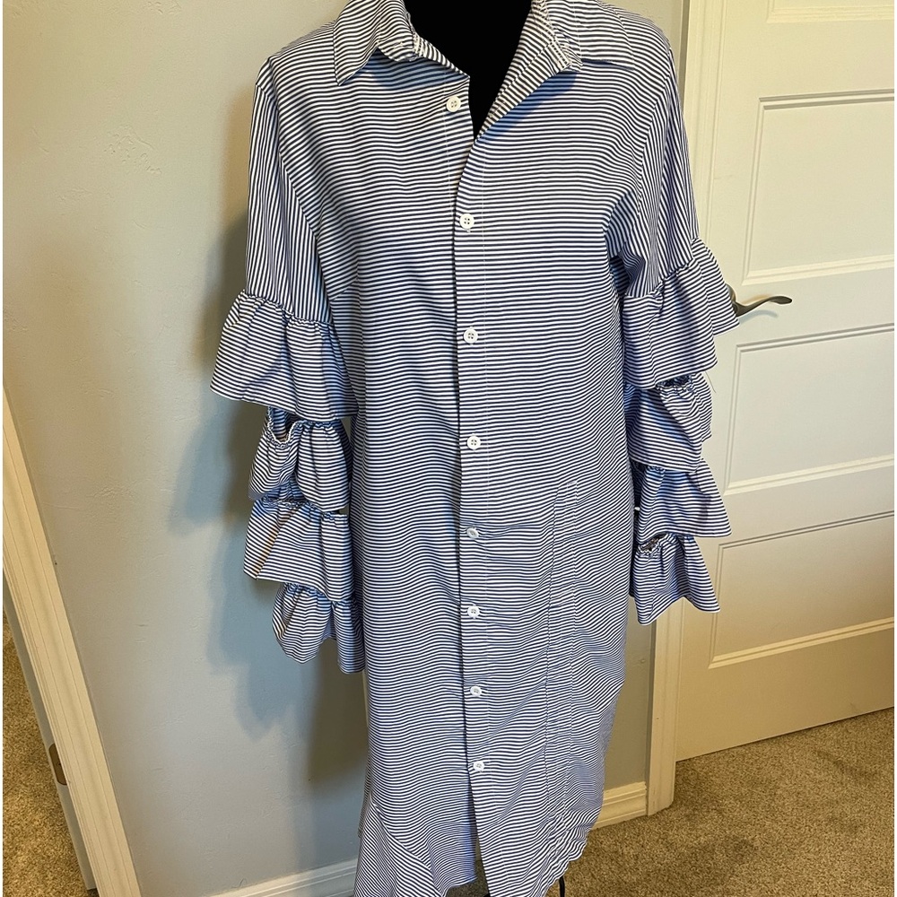 Shirt dress has ruffled sleeves and Beachy vibe